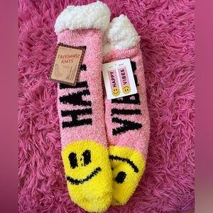 Soft,fuzzy thick socks for women with smiley face color pink.